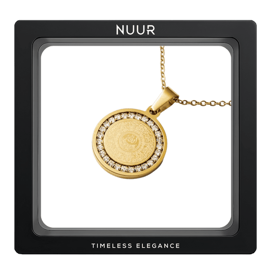 NUUR Ayatul Kursi gold medallion necklace with a zircon halo in a black display frame