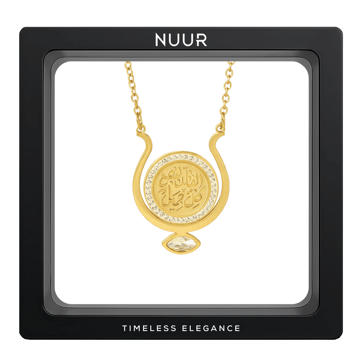 NUUR Qalb gold medallion necklace with a zircon halo and marquise stone in a black display frame