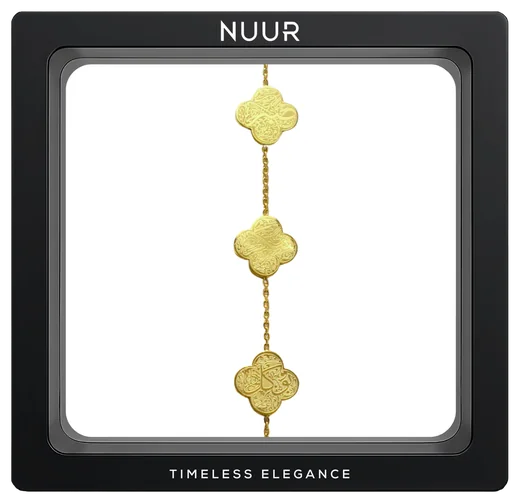 NUUR Sabr gold-plated clover bracelet with engraved stations, in a black display frame